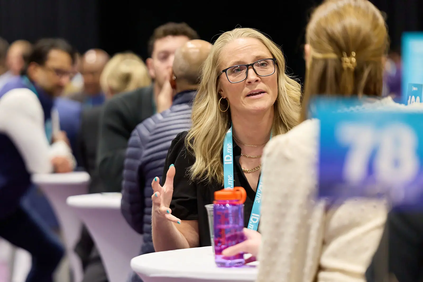 A practitioner talking across a Breakthru meeting table