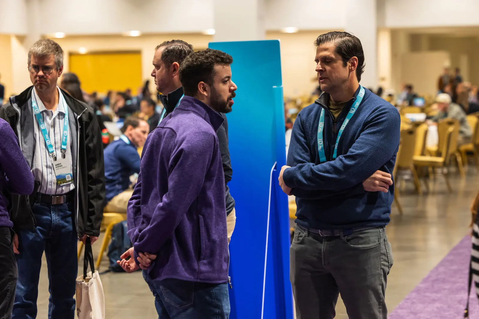 Two attendees in conversation on the networking floor
