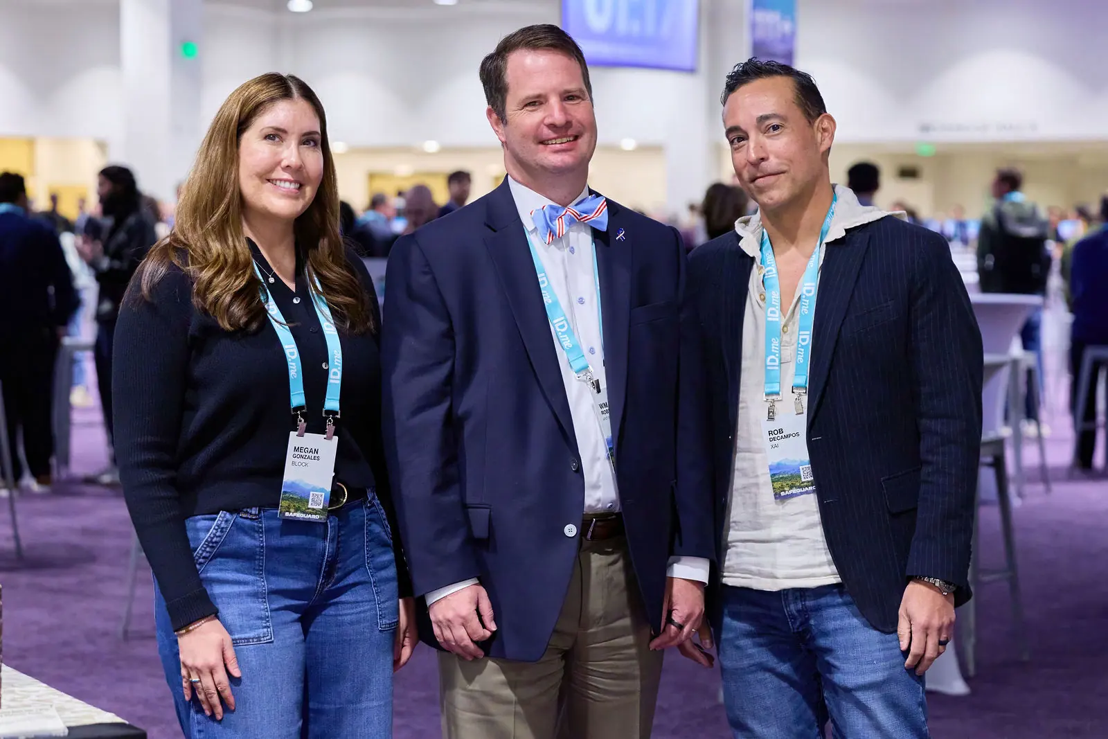 Three attendees together at the close of a session