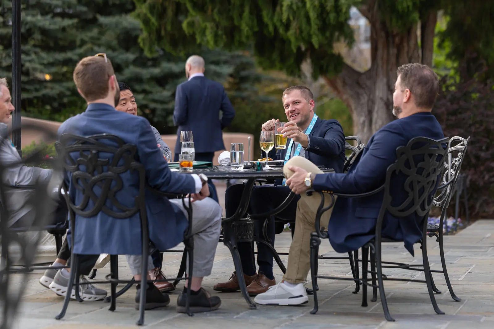 Conversation on the terrace overlooking the Broadmoor grounds